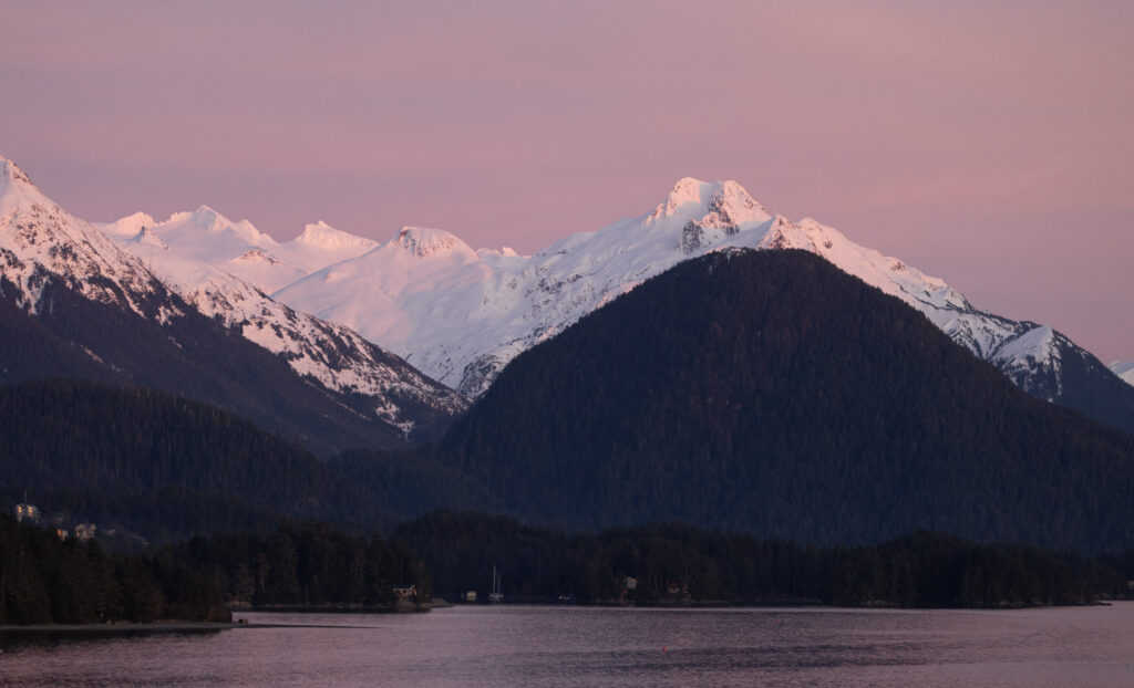 Alpenglow on Snow-covered Mountains