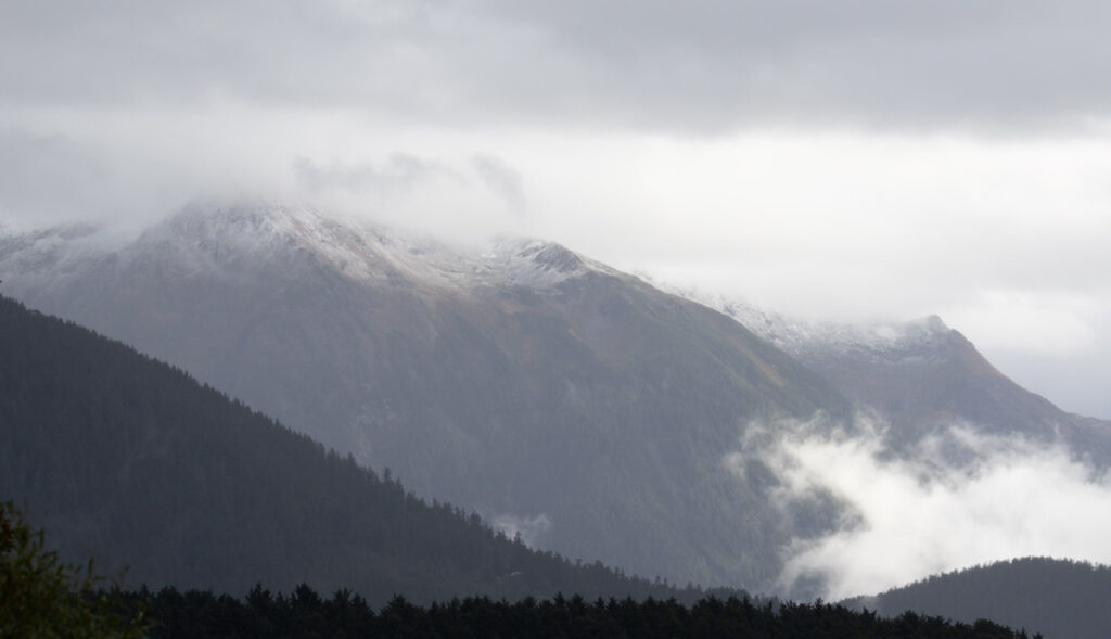 Clouds and Snow on Mountain Tops