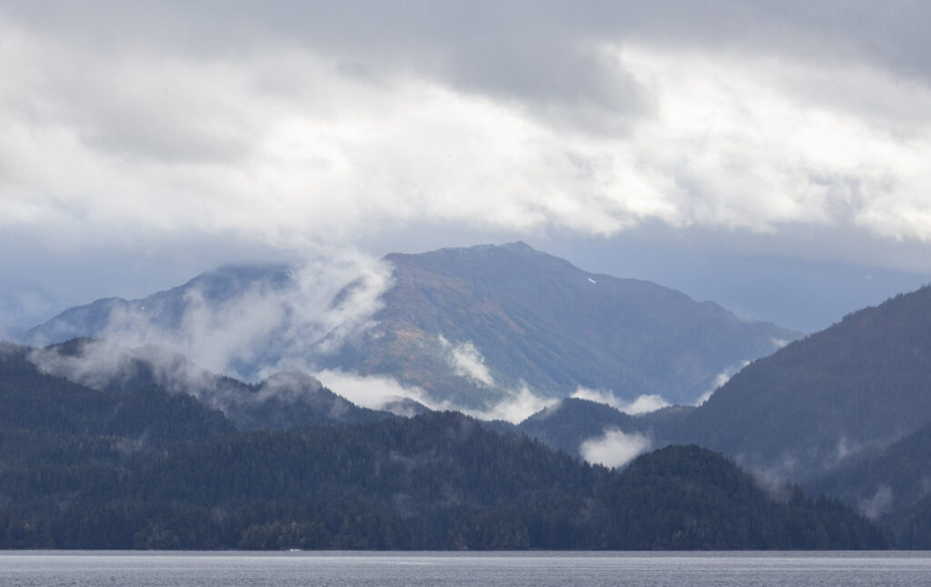 Clouds and Forested Ridges