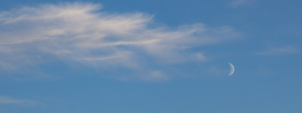 Blue Sky, Clouds and Moon