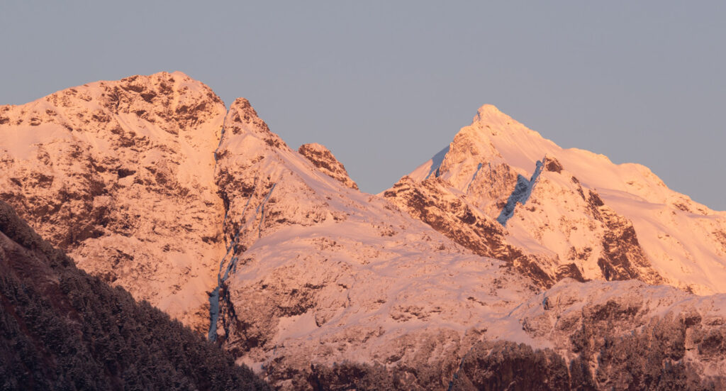 Alpeglow on Snowy Mountains