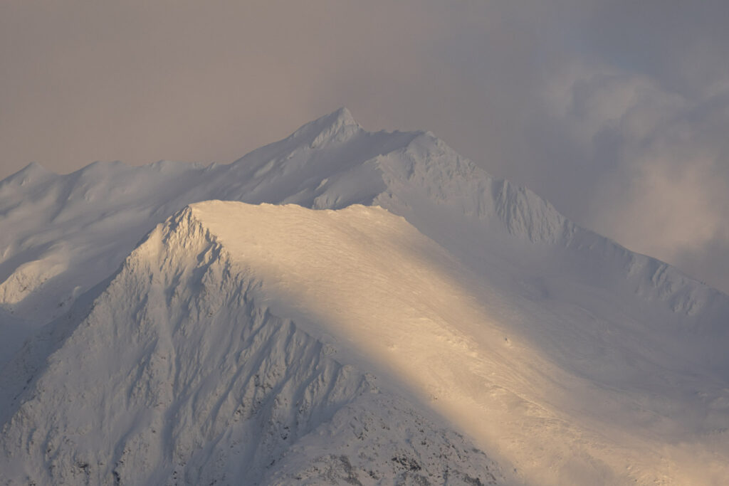 Snow, Shadow and Light on Mountain Peak