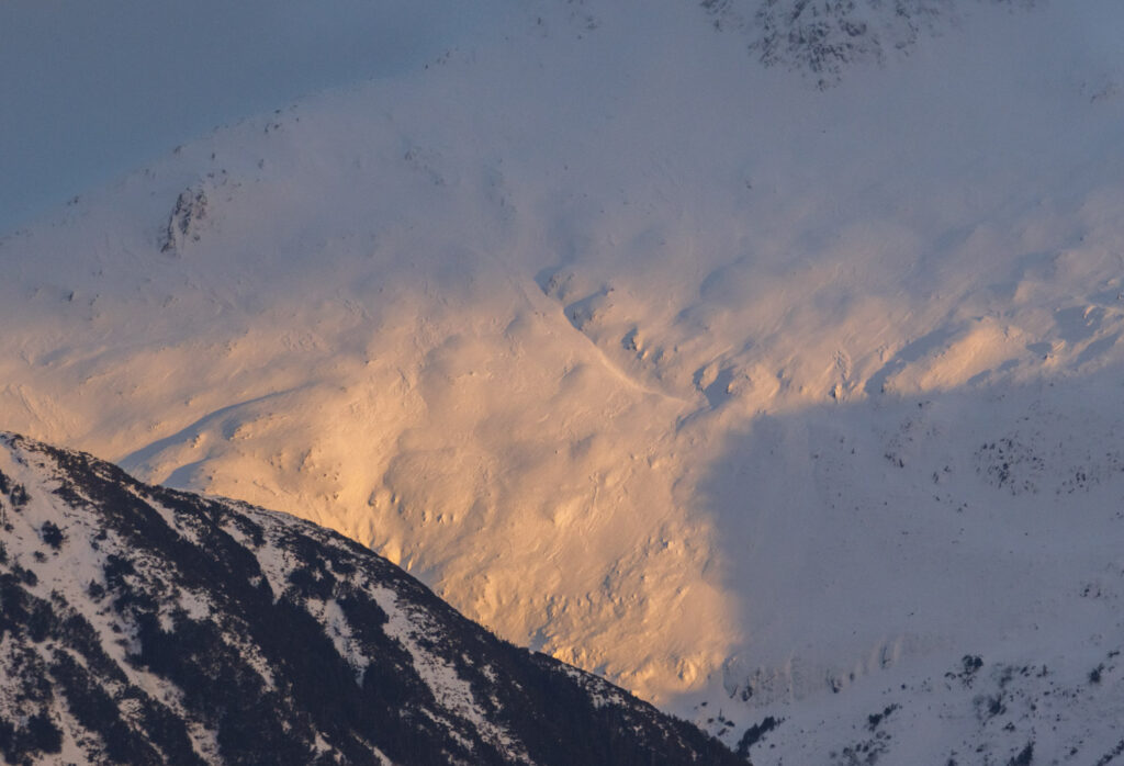 Sunlight on Snowy Slope